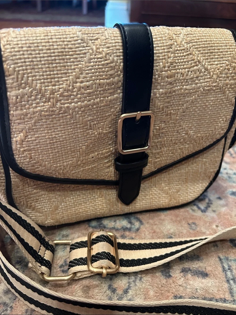 Neutral Woven Crossbody Bag with Black Trim and Striped Strap
